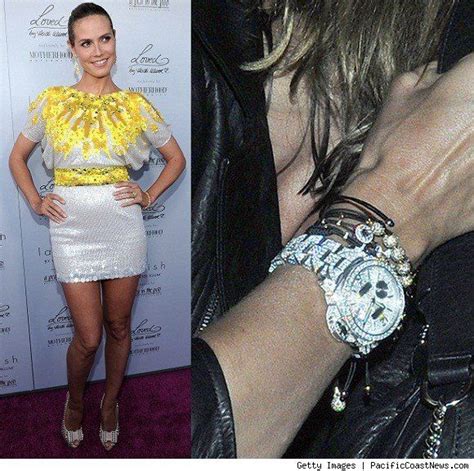 Heidi Klum wears Panerai Luminor Marina 44 mm watch.